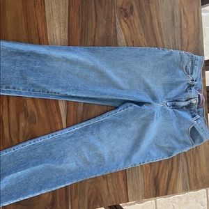 Boot cut blue jeans with button and zipper